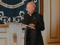 El presidente de Cáritas Castrense Barcelona, Pater Javer Orpinell, durante su alocución